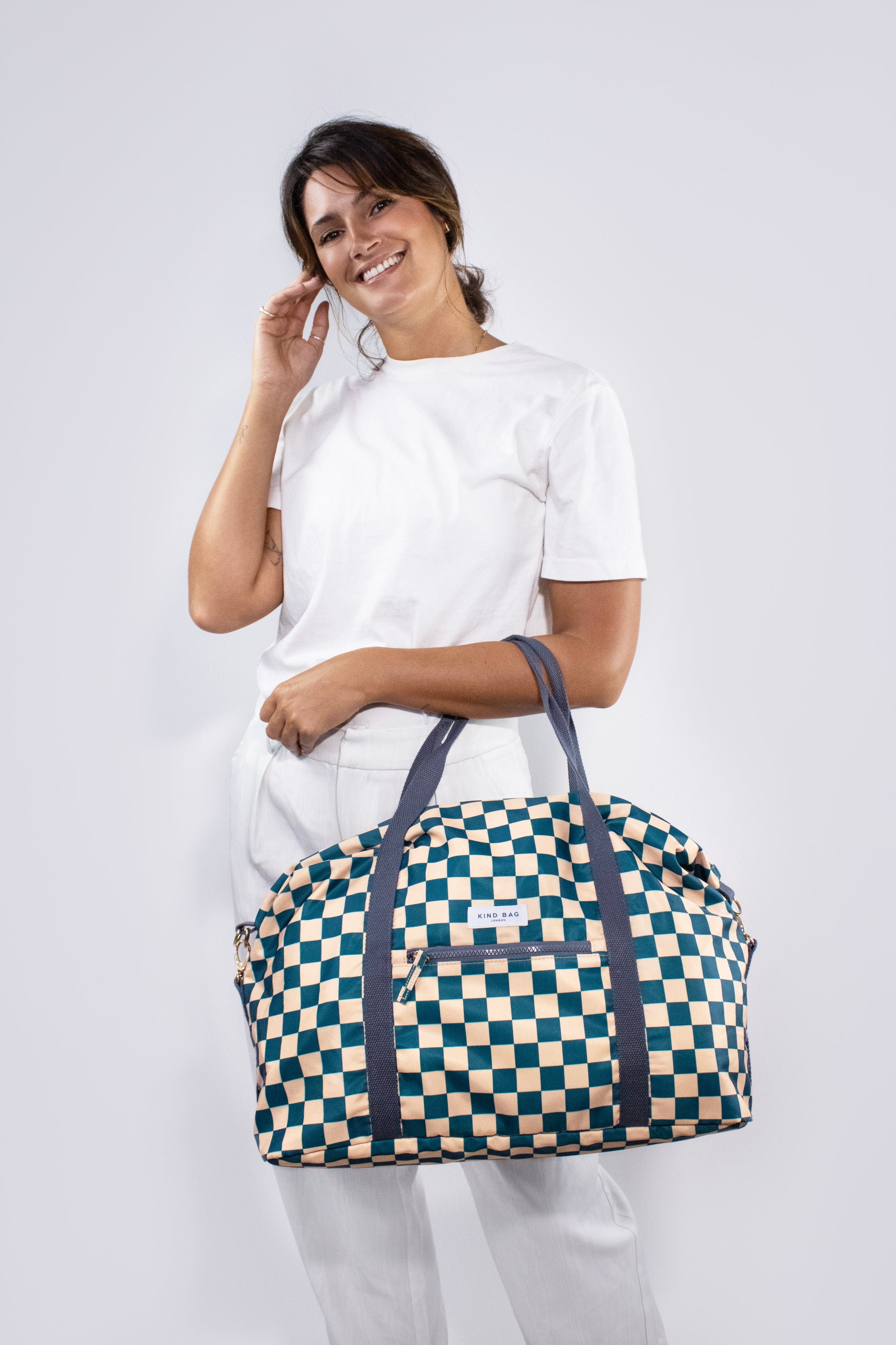 White checkered weekender bag sale