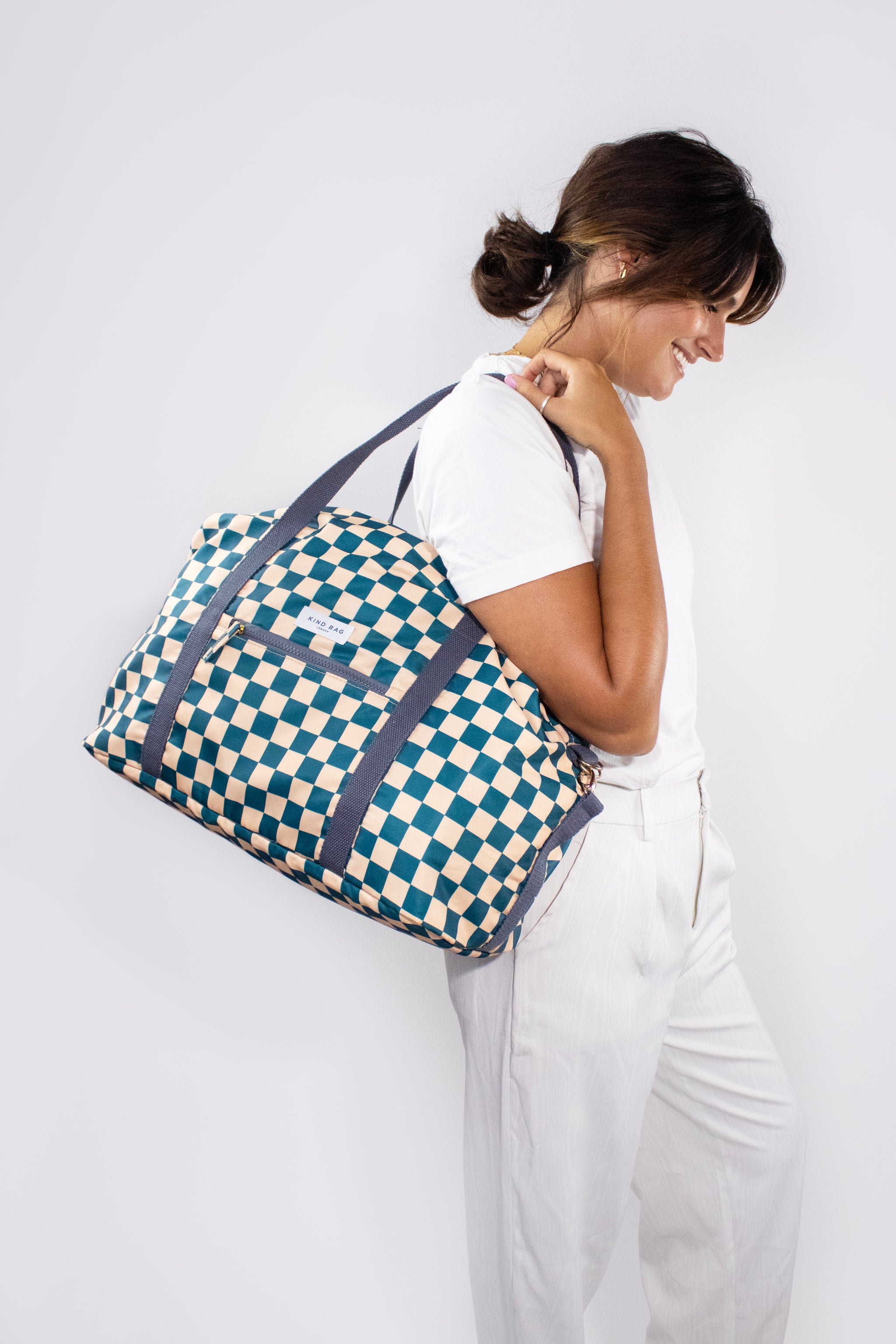 Checkerd large over store night bag